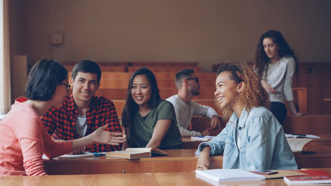 Students talking and laughing in a lecture hall